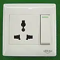 A so-called "universal socket", which meets no official standard[6] but is intended to accept a number of different plug types