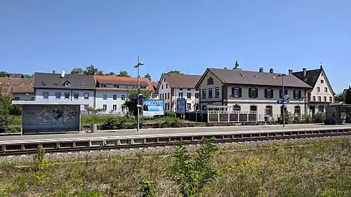 Station with island platform and two tracks