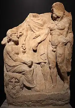 Marble votive relief of Zeus Meilichios sitting on the Acheloos River, with Hermes, Heracles, the Mother of the Gods, and Callirrhoe. Found in the Ilisos River, near Athens. Early 3rd century BC