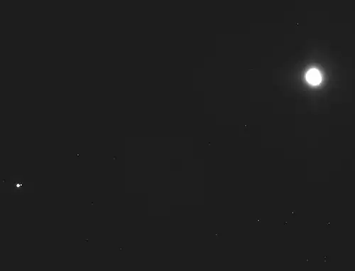 Earth-Moon (lower left) and asteroid Bennu (upper right) (December 2018)[121]