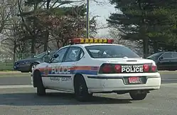Chevy Impala patrol vehicle at Hempstead Turnpike and Merrick Avenue