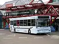 An NEC Plaxton Pointer 1 bodied Dennis Dart SLF shuttle bus outside atrium entrance 2