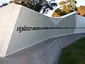 East face of memorial with inscription.