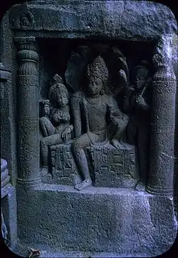 High relief sculpture of Naga couple, from Ajanta Cave #19, Maharashtra, India. 500–1000 BCE[79]