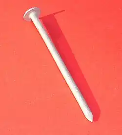 A metal nail has a small cross sectional area compared to its mass, resulting in a high Sectional Density.