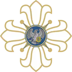 The Women's Home Defense's central symbol (lily cross).