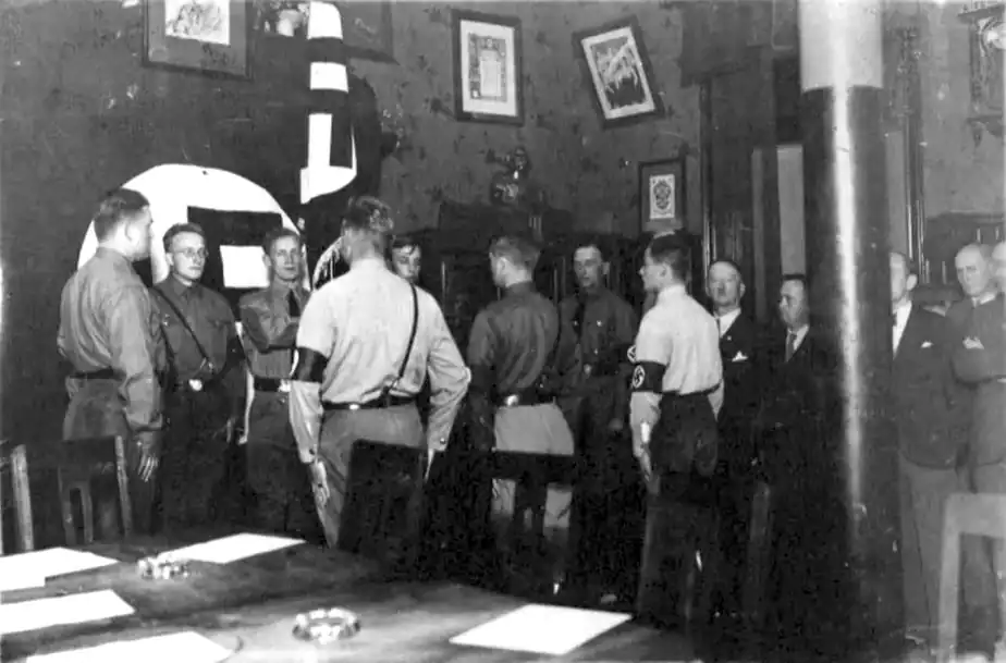 Background left: possibly Philip Citroën and U-530's captain, amongst uniformed Nazis and others