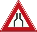 J17: Road narrows on both sides