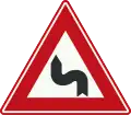 J5: Double bend, first to left