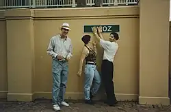 Image 129Trio in 1995 wearing neutral-colored tops and relaxed-fit, slim-leg pants and jeans. (from 1990s in fashion)