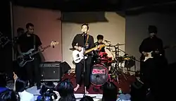 Ngọt performing in 2016