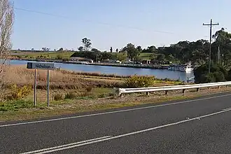 Eastern entry to town looking across the Nicholson River to the boat ramp