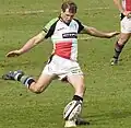 Nick Evans, All Black was a member of New Zealand's Under 20s, says Aussie Rules improved his kicking[32]