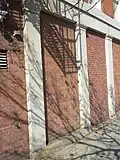 Street Building along State Street Monolithic granite piers with Doric capitals marking the original street storefronts.