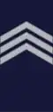 A sergeant rank slide with three chevrons