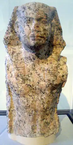 Fragmentary statue of a Fifth Dynasty king, likely to be Nyuserre[25]