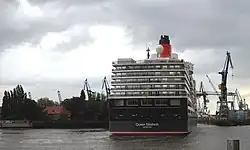 The Azipod system holds the ship in position against a wind from the north-east.