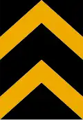 Lanes diverge either side of the marker