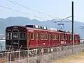 An ex-Nose Electric Railway 1500 series converted to a "MIHARA-Liner" test train at Mitsubishi Heavy Industries's test track at Mihara