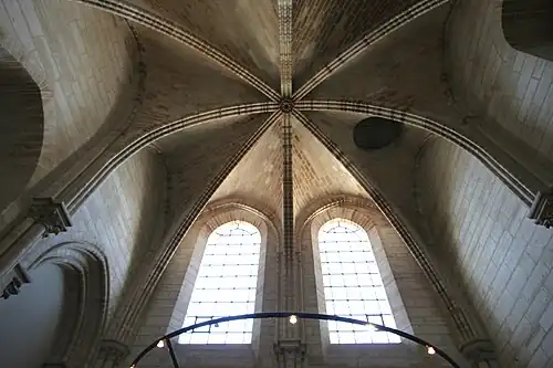 Circular utility door (right of center) in the ceiling below the north tower made for raising and lowering bells[155]