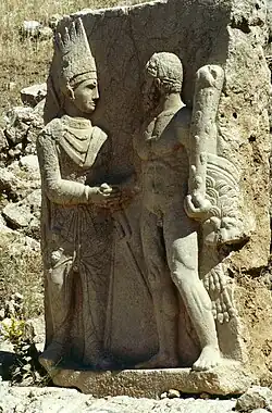 Antiochus I Theos of Commagene, shaking hands with Heracles 70–38 BC, Arsameia.