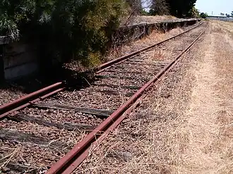 Close up view of the platform (Nov. 2009). By 2012 this track had been dismantled and replaced by a concrete footpath. (May, 2012)