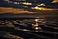 Dusk at the Matama Coast tidal flats