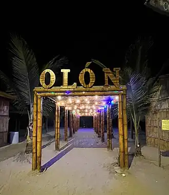 A tourist sign on the beach