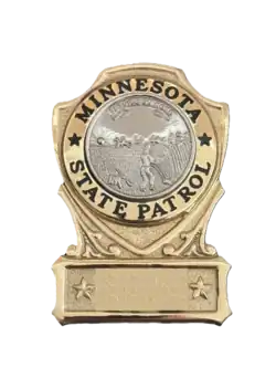 Badge 1974-2025