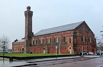 Ashton Turkish baths (beyond chimney). Building in 21st century