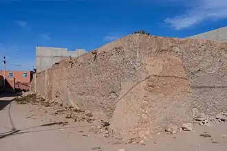 Old compound wall, mud and stone