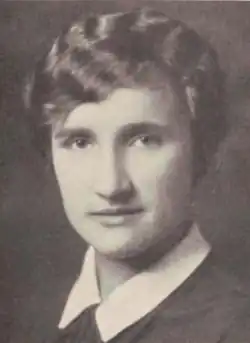 A young woman with wavy hair