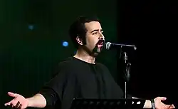 Omid Nemati performing with Pallett in 2015