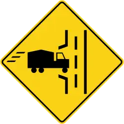 Heavy vehicles entering from left