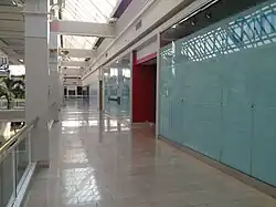 A closed store at Owings Mills Mall, likely a former GNC.