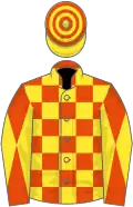Fluorescent orange and yellow blocks, diabolo on sleeves, yellow and orange hooped cap
