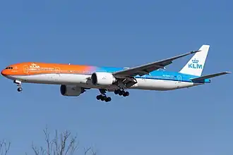 Boeing 777-300ER in special "Orange Pride" livery