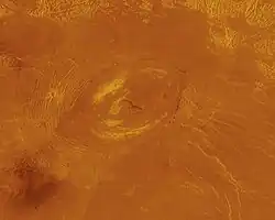 Sacajawea Patera, a large, elongate caldera on the smooth plateau of Lakshmi Planum, approximately 1.2 km deep and 120 by 215 km in diameter.