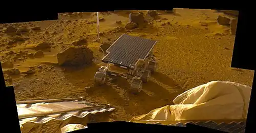 The sol 2 "insurance panorama" of Sojourner, taken on 530, 600, and 750&nbsp;nm filters.[b]
