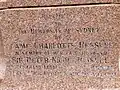 Plaque affixed to the base of the memorial statue for Russell on the grounds of the University of Sydney