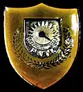 Former badge of the post-independence National Police of Timor-Leste
