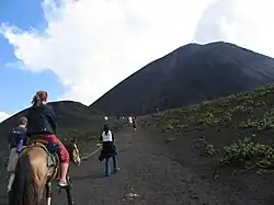 Tourists climbing Pacaya (2004).
