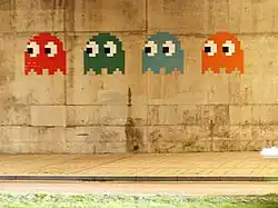 The ghosts from the computer game Pac-Man. A mosaic by Invader in Bilbao, Spain.