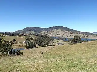 Paddocks in Villeneuve with Mount Archer in the background, 2015