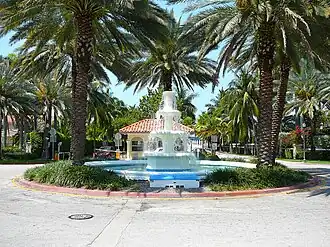 Fountain and guard gate at the entrance to Palm Island in Miami Beach from the MacArthur Causeway