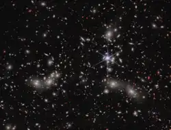 Pandora's Cluster observed by James Webb Space Telescope's NIRCam as part of UNCOVER program (15 February 2023).[16]
