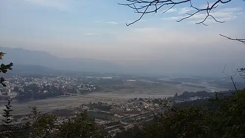 View of Paonta Sahib from uphill with Yamuna seen flowing