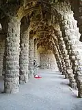 Colonnaded footpath under a viaduct