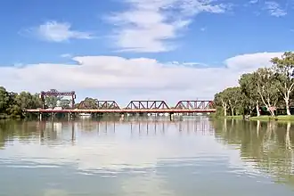 Paringa bridge. The central route, which once carried trains, now provides a safe route for pedestrians and cyclists. One lane on each side of the central route carries road vehicles.