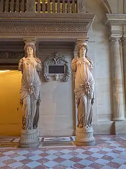 Renaissance caryatids of the musicians' loft in the Louvre Palace, Paris, by Jean Goujon, 1550[24]